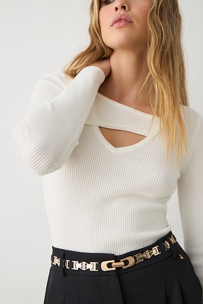 Sweater with rhinestones and cut out
