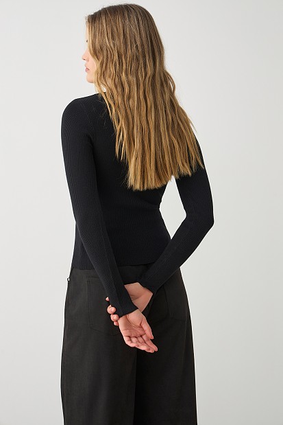 Sweater with rhinestones and cut out