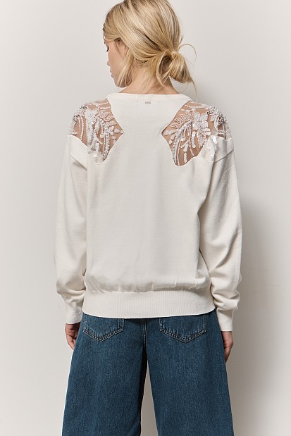 Sweater with motive and beads