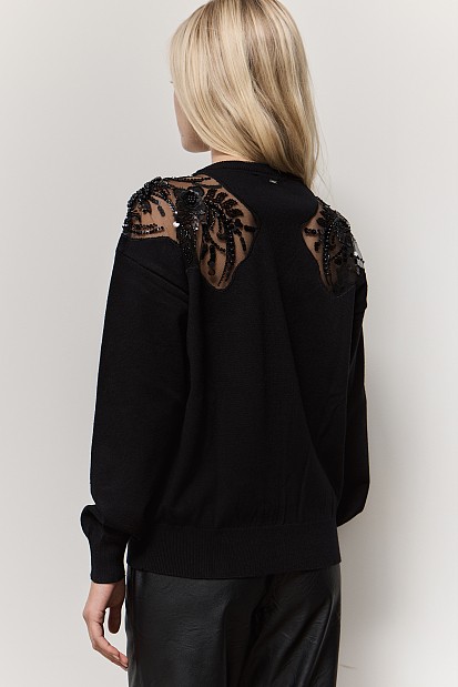 Sweater with motive and beads