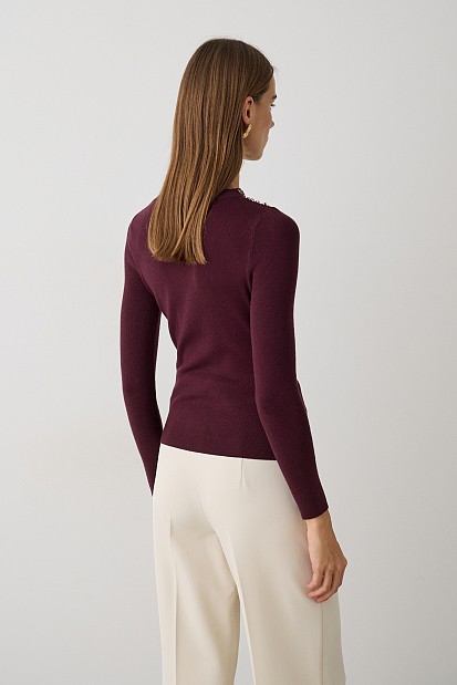 Cut out sweater with beads