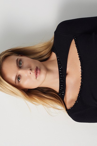 Cut out sweater with beads