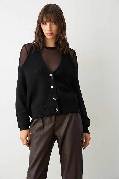 Sweater with buttons and cut out