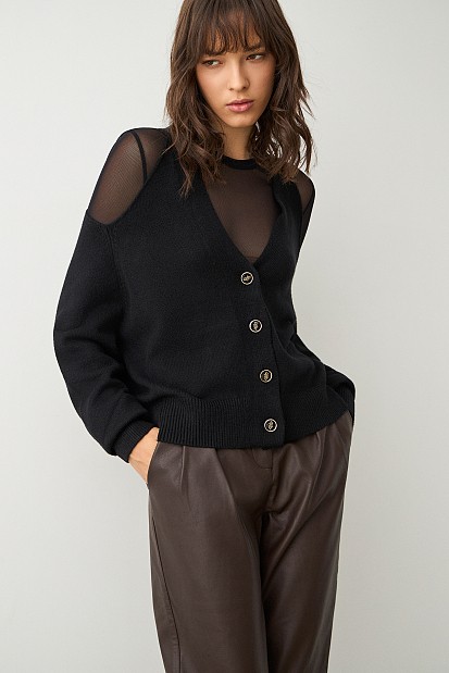 Sweater with buttons and cut out