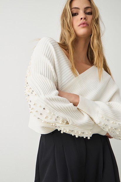 Wrap sweater with beads