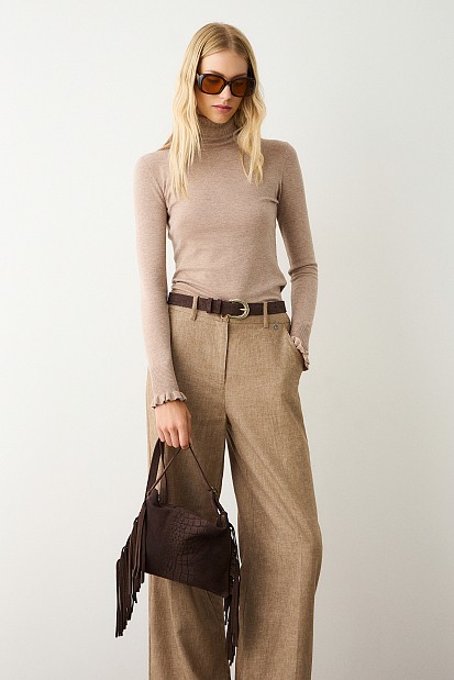 Turtleneck sweater with frills on the sleeves