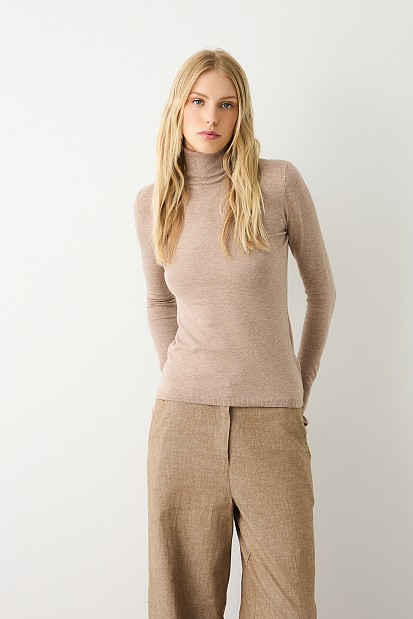 Turtleneck sweater with frills on the sleeves