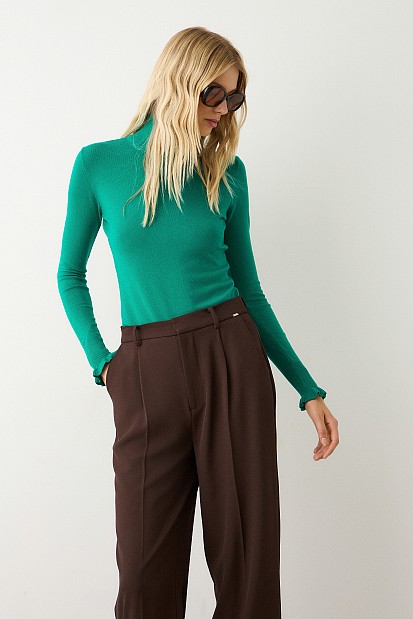 Turtleneck sweater with frills on the sleeves