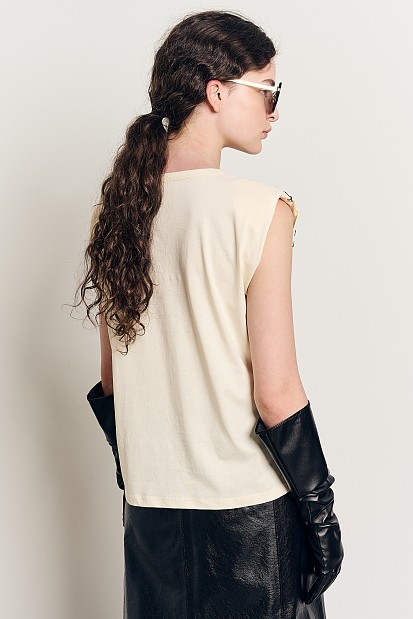 Sleeveless blouse with embossed print