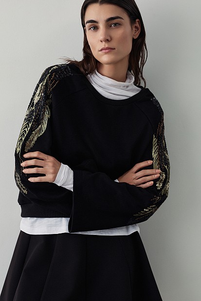 Sweatshirt with embroidered sleeves