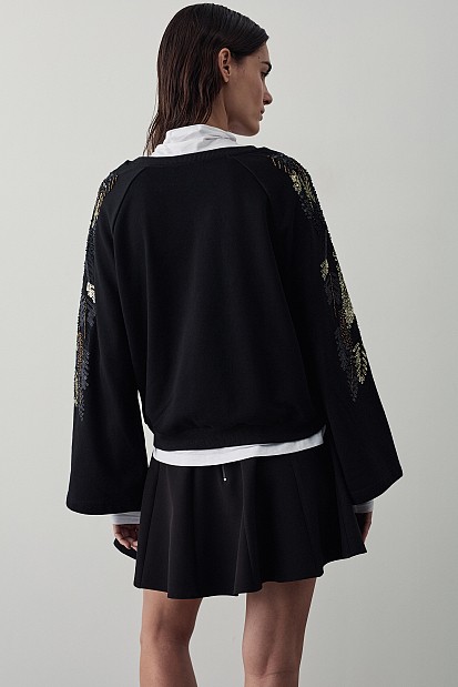 Sweatshirt with embroidered sleeves