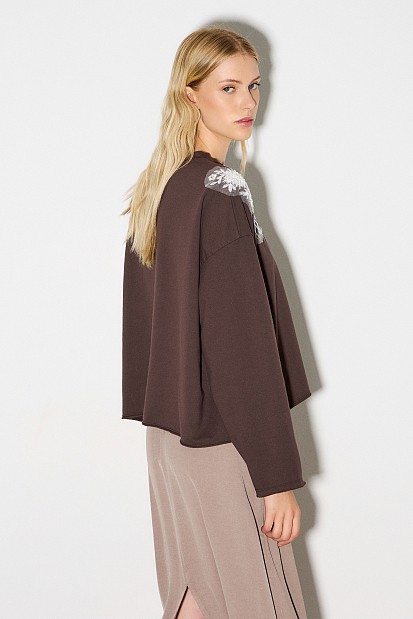 Sweatshirt with motive on the shoulders