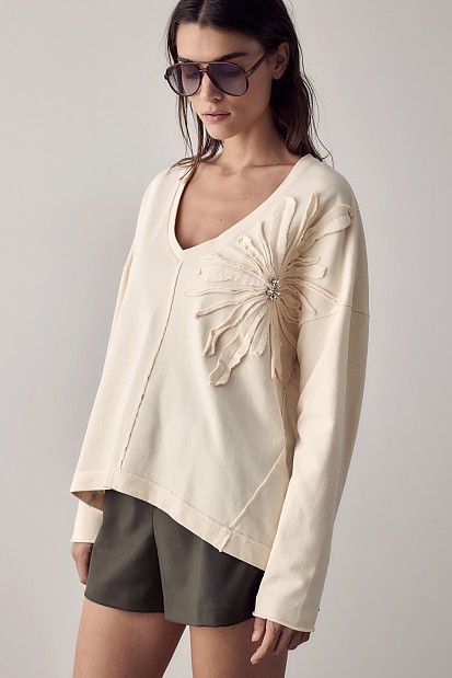 Sweatshirt with embossed flower