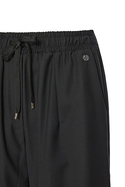 Pants with self-tie strap