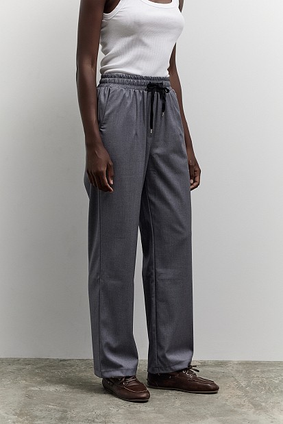 Pants with self-tie strap