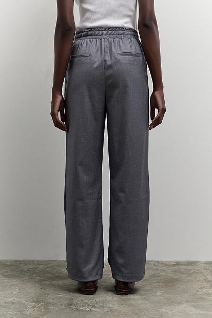 Pants with self-tie strap