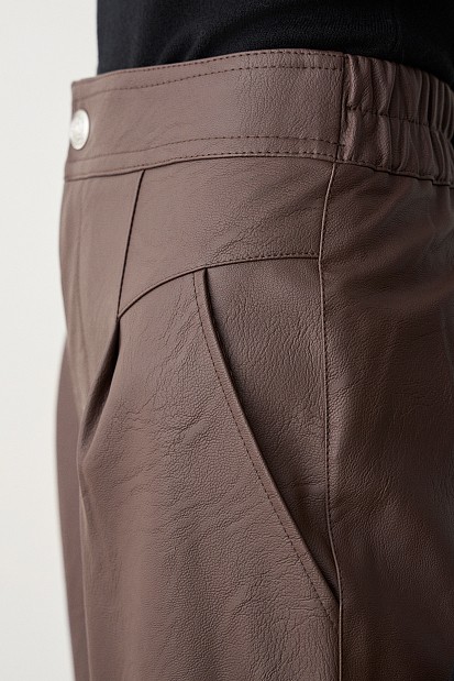 Leather look pants with pleat