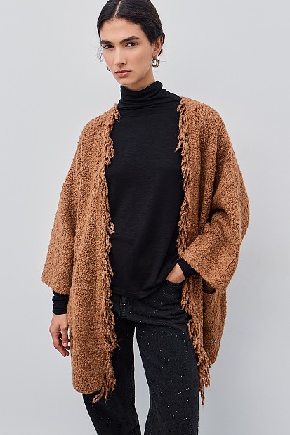 Μπουκλέ ζακέτα με κρόσια