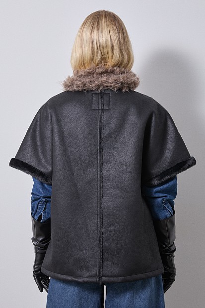 Leather look vest with fur