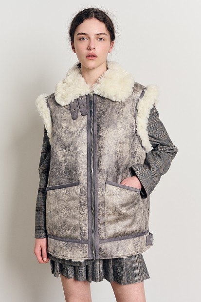 Vest with inner faux fur