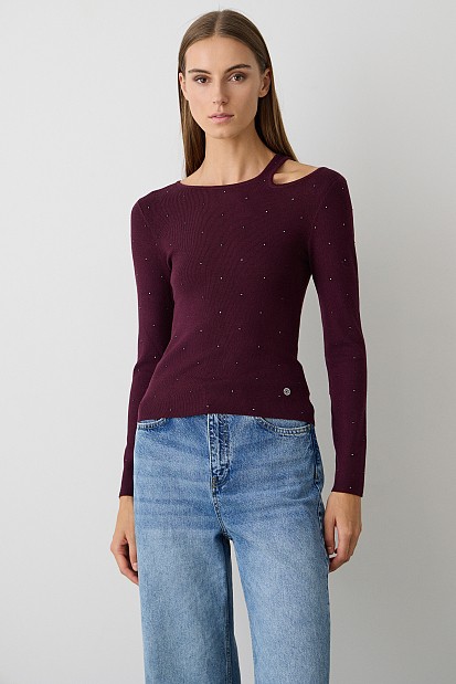 Cut out sweater with rhinestones