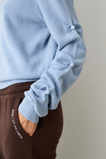 Sweater with gathered sleeves