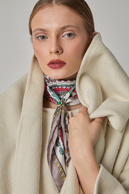 Printed scarf with jewelry