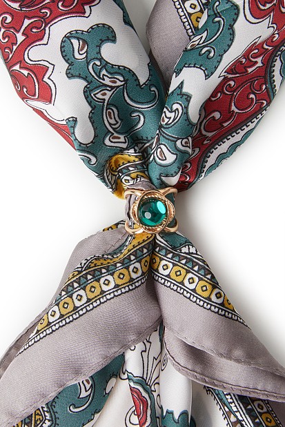 Printed scarf with jewelry