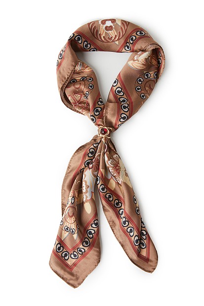 Printed scarf with jewelry