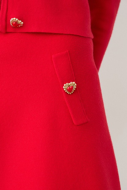 Mini knitted skirt with decorative buttons