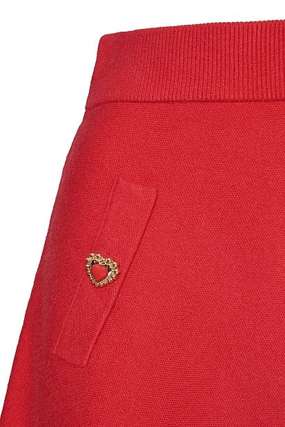 Mini knitted skirt with decorative buttons