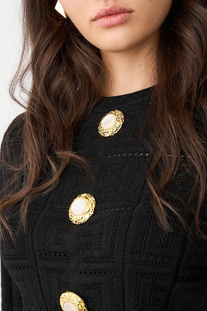 Sweater with bejewelled buttons