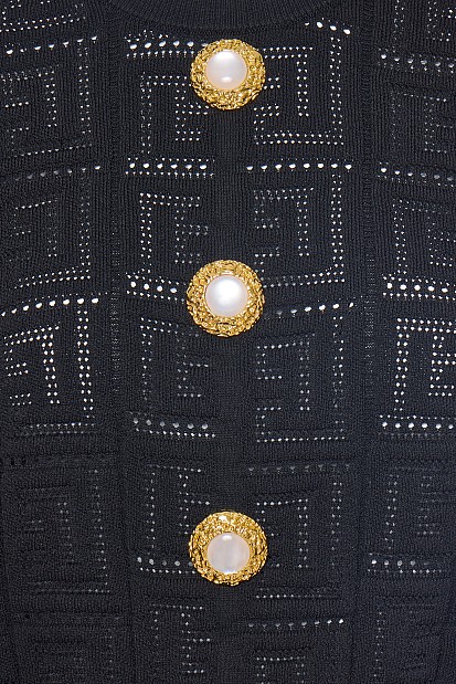 Sweater with bejewelled buttons