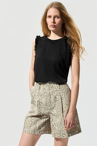 Blusa sin mangas volantes