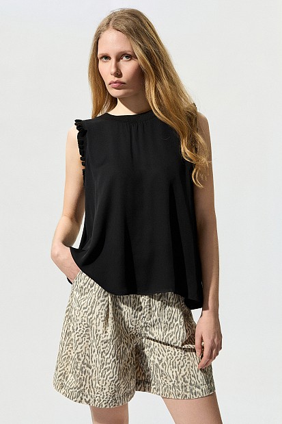 Blusa sin mangas volantes