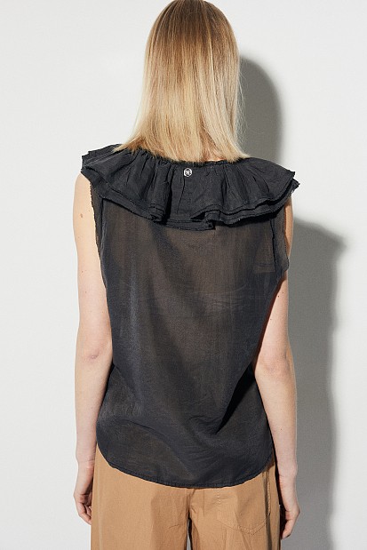 Sleeveless blouse with ruffles