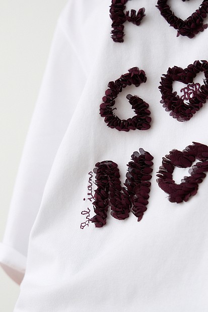 T-shirt with embossed print