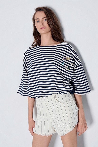 Striped blouse with decorative details