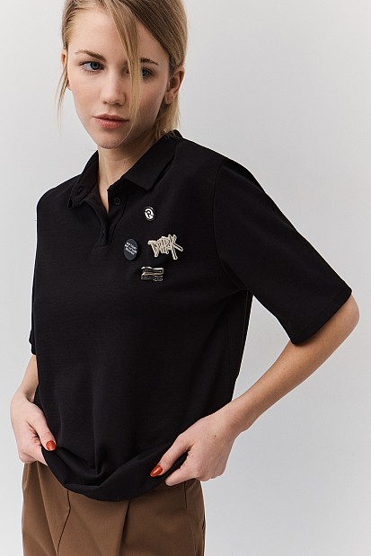 Polo blouse with badges