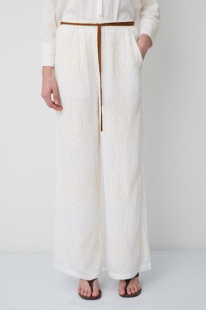 High-waisted trousers with embroidered detailing