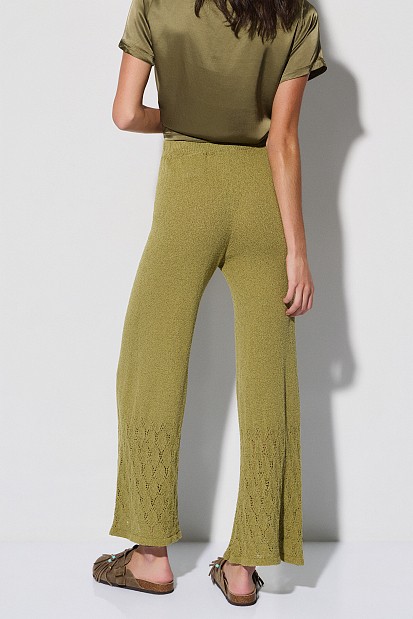 Knitted trousers with cut-work detailing
