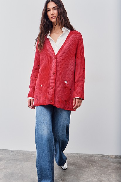 Knitted cardigan with rips