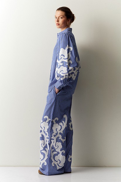 Striped shirt with embroidered sleeves