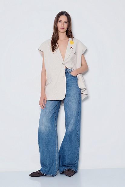 Striped vest with pins