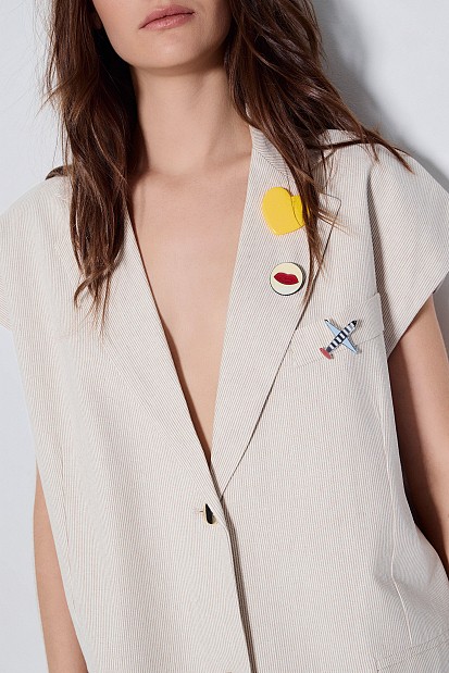 Striped vest with pins