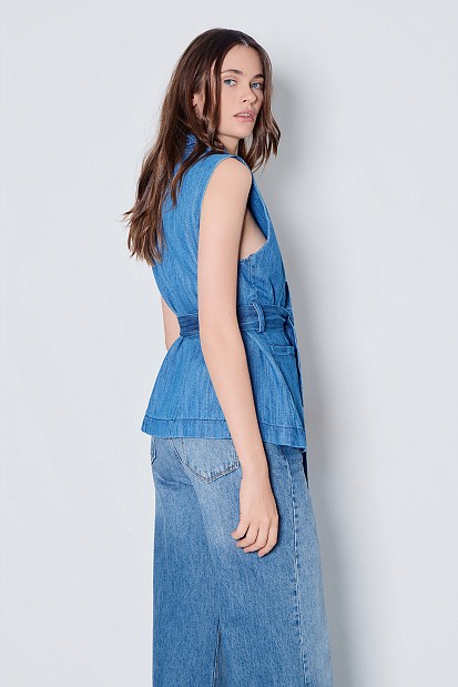 Long denim vest with a belt
