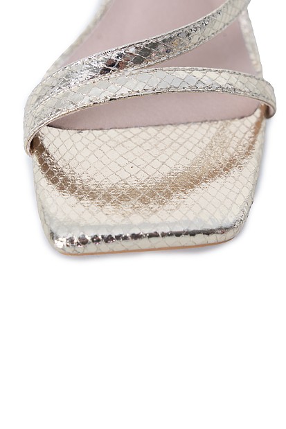 Heeled sandals with straps