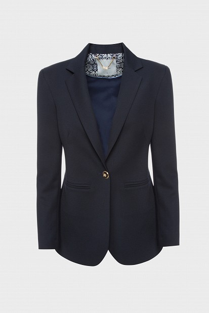 Tailored blazer with bejeweled button