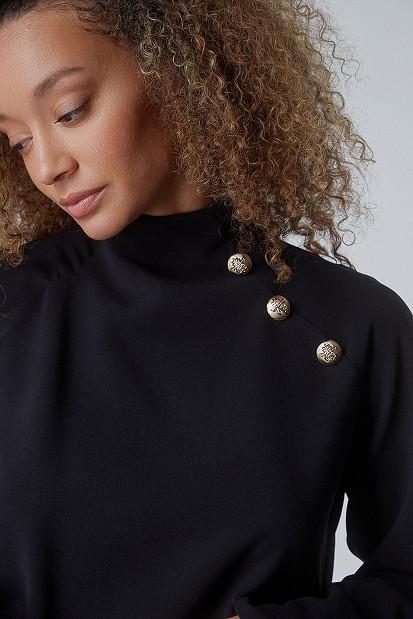 Blouse with bejeweled buttons
