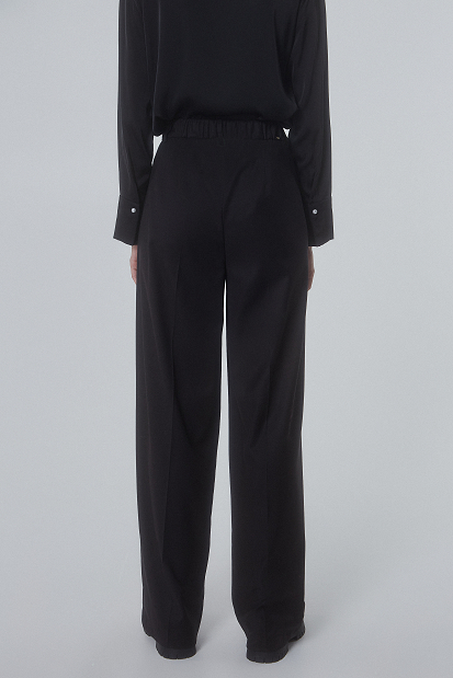 Trousers with elasticated waistband